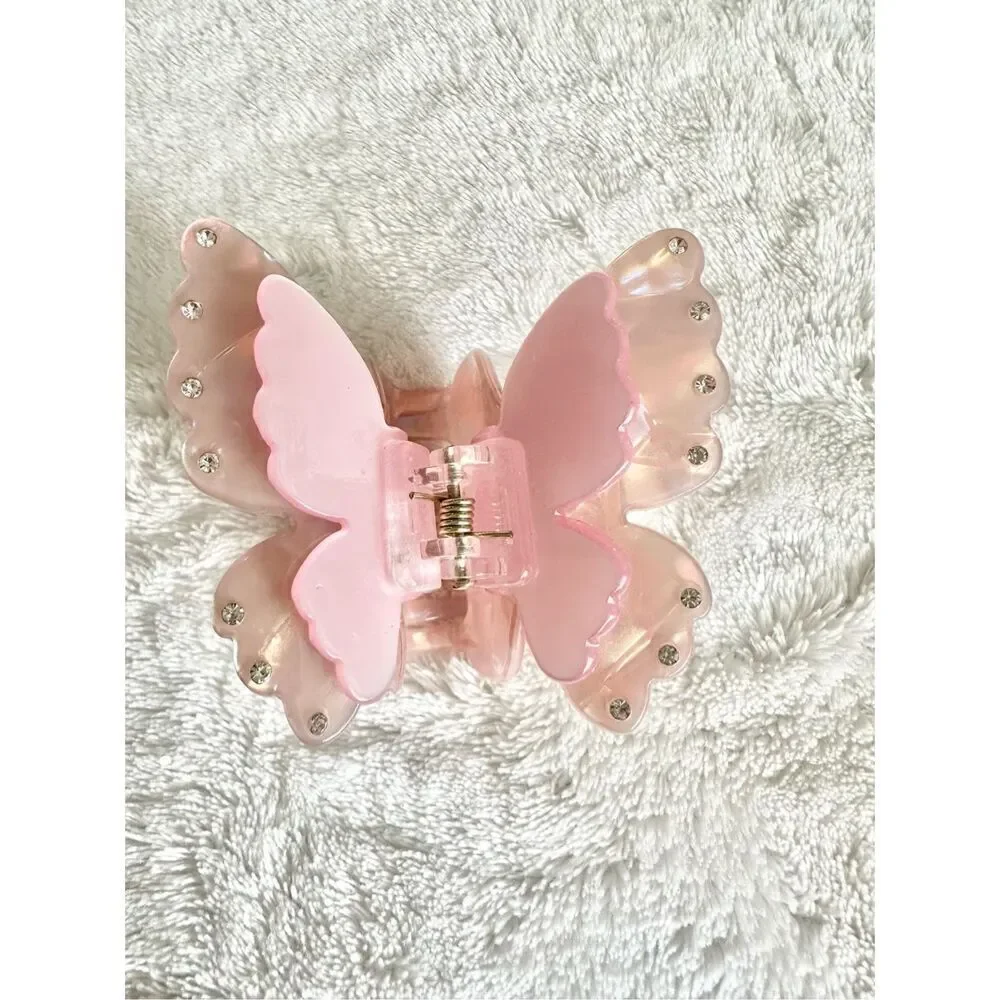 Light pink rhinestone butterfly hair claw